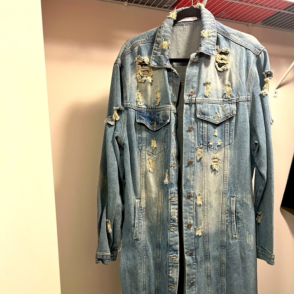 Distressed long denim jacket